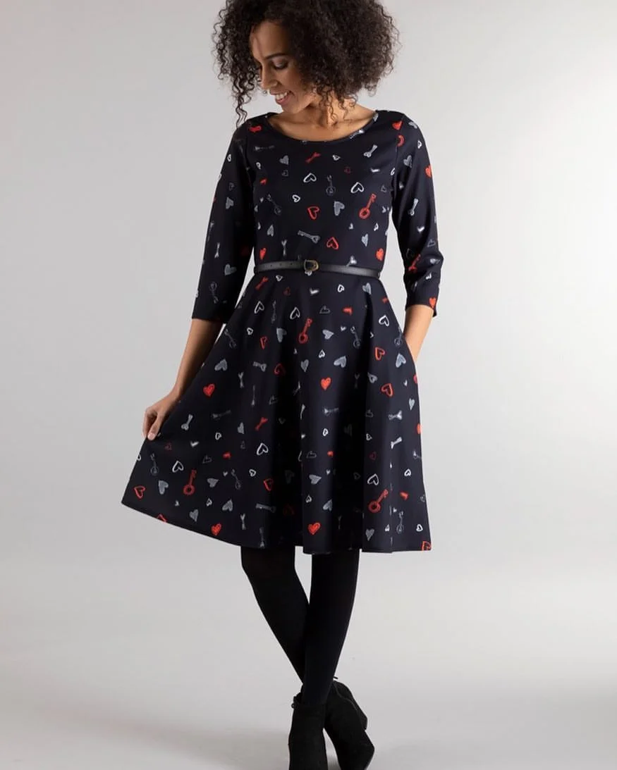Playful Printed A-Line Dress With Black Tights and Boots