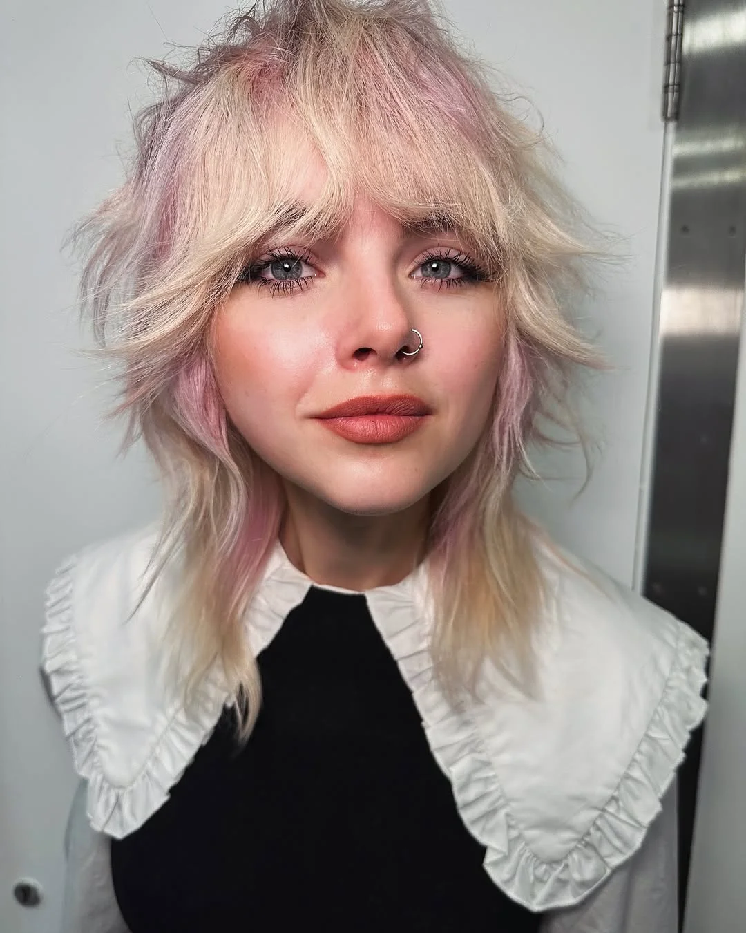 Shaggy Wolf Cut With Pastel Pink Highlights