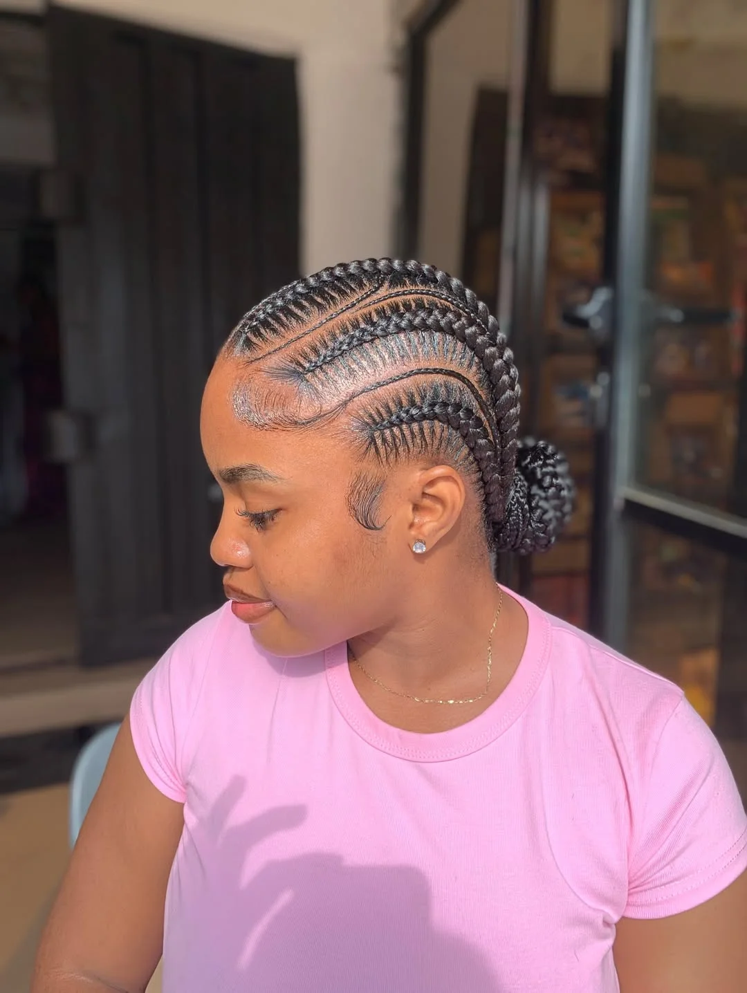 Sleek Cornrows Into Low Bun With Edges