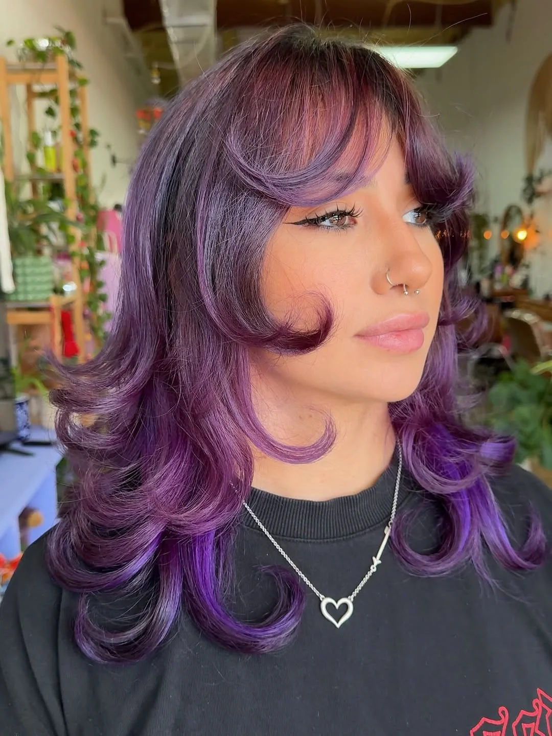 Vibrant Purple Wolf Cut With Curtain Bangs